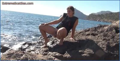 Nadya Stars in Hardcore Scat Video Crap My Pants by the Sea